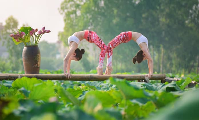 12 yoga poses for two that will teach you to trust