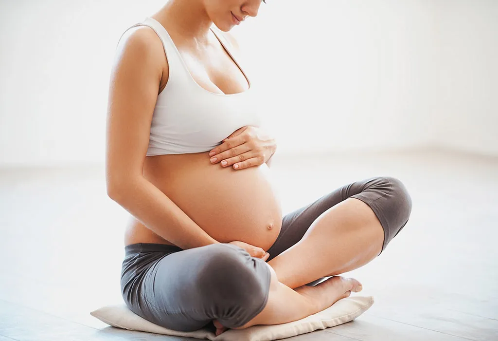 Why should some yoga poses be avoided during pregnancy?