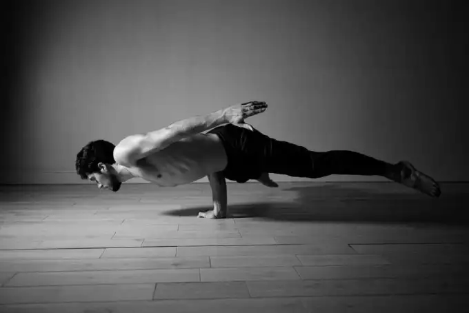 Pungu Mayurasana (Wounded Peacock Pose)